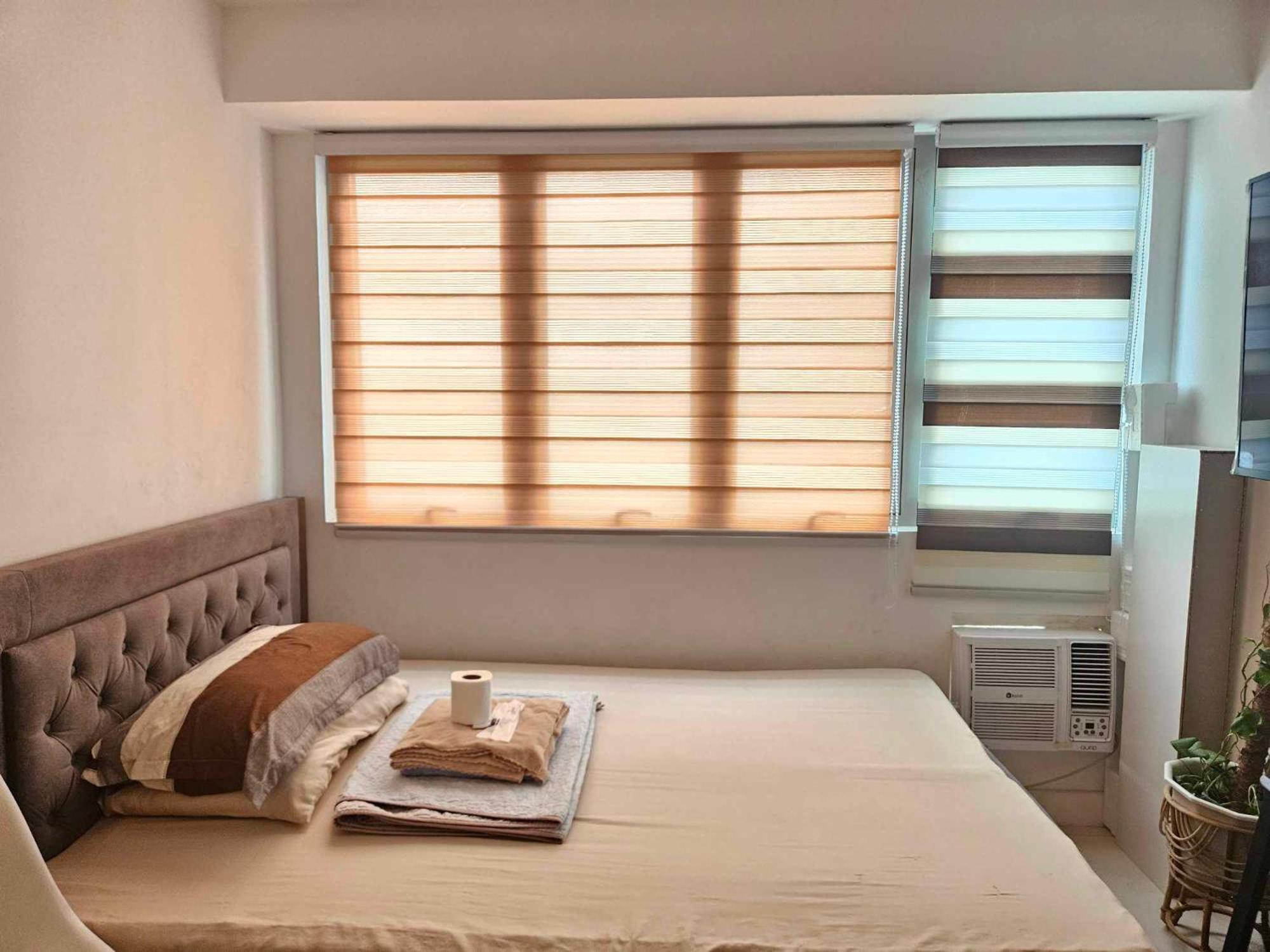 كويزون سيتي The Residences At Commonwealth By Century Properties المظهر الخارجي الصورة